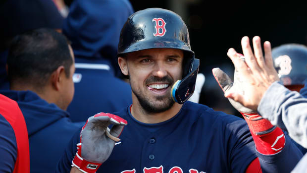 Apr 8, 2023; Detroit, Michigan, USA; Boston Red Sox center fielder Adam Duvall (18) receives congratulations from teammates after he hits a three run home run in the third inning against the Detroit Tigers at Comerica Park.